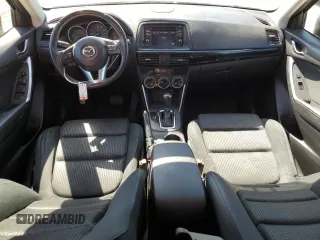 2015 Mazda CX-5 Touring with VIN JM3KE2CY5F0483492, listed as a Copart auction lot 48426065 with 158,749 mi miles and Salvage Title. Bid and sale history available at carsss.com. Image 8.