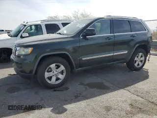 2011 Jeep Grand Cherokee Laredo with VIN 1J4RR4GG2BC636423, listed as a Copart auction lot 51169135 with 143,058 mi miles and Salvage Title. Bid and sale history available at DreamBid. Image 1.