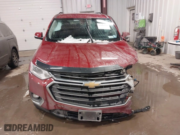 2021 Chevrolet Traverse LT Cloth with VIN 1GNEVGKW8MJ124350, listed as a IAAI auction lot 41456704 with 121,336 mi miles. Bid and sale history available at carsss.com. Image 12.