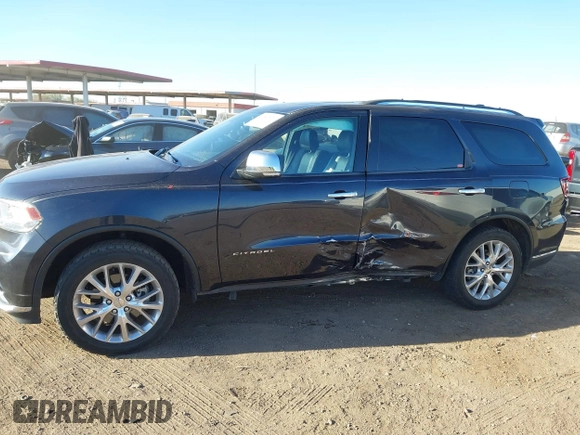 2015 Dodge Durango Citadel с VIN 1C4RDHEGXFC907426, выставлен на аукционе IAAI как лот 41510971 с пробегом 100 145 миль миль и . История ставок и продаж доступна на DreamBid. Изображение 14.