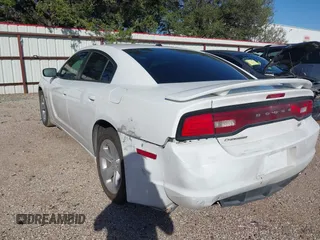 2013 Dodge Charger RT with VIN 2C3CDXCT3DH692776, listed as a IAAI auction lot 41229156 with 218,727 mi miles. Bid and sale history available at carsss.com. Image 3.