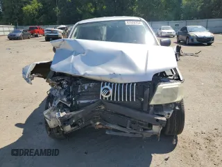 2005 Mercury Mariner Luxury z VIN 4M2YU56165DJ21260, wystawiony jako Copart lot #67528354 z przebiegiem Nie podano mil oraz Szkoda całkowita • Salvage title. Historia ofert i sprzedaży dostępna na DreamBid. Obrazek 5.