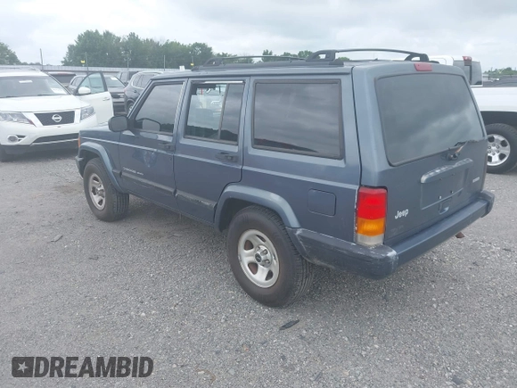 2001 Jeep Cherokee Sport with VIN 1J4FT48S61L594229, listed as a IAAI auction lot 42520336 with 190,862 mi miles and . Bid and sale history available at DreamBid. Image 3.