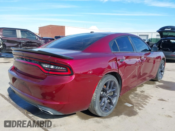 2020 Dodge Charger SXT with VIN 2C3CDXBG3LH104815, listed as a IAAI auction lot 41328084 with 130,322 mi miles and . Bid and sale history available at DreamBid. Image 4.