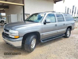 2001 Chevrolet Suburban LS with VIN 3GNEC16T11G137294, listed as a Copart auction lot 53555015 with 161,674 mi miles and Salvage title. Bid and sale history available at DreamBid. Image 1.