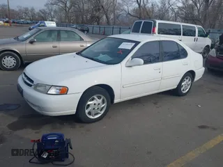 1999 Nissan Altima XE with VIN 1N4DL01DXXC189667, listed as a IAAI auction lot 41715276 with 132,425 mi miles. Bid and sale history available at carsss.com. Image 2.
