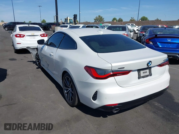 2022 BMW 4 Series 430i xDrive with VIN WBA73AP03NCH61029, listed as a IAAI auction lot 42327779 with 104,860 mi miles and . Bid and sale history available at DreamBid. Image 3.