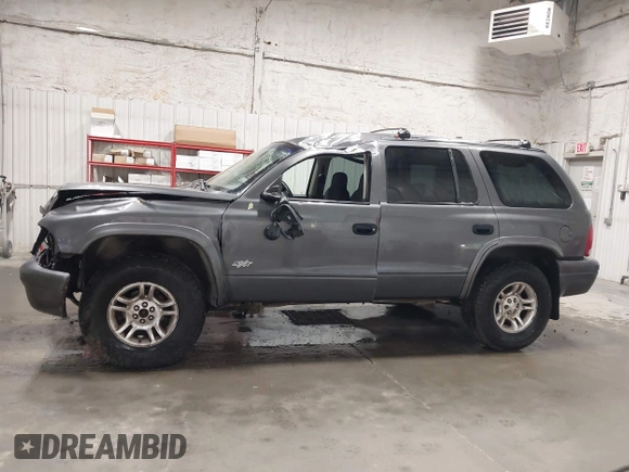 2002 Dodge Durango Sport with VIN 1B4HS38N72F206590, listed as a IAAI auction lot 42239207 with 202,490 mi miles and . Bid and sale history available at DreamBid. Image 14.