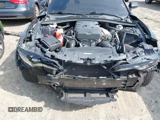 2019 Chevrolet Camaro 1LT z VIN 1G1FA1RX1K0127249, wystawiony jako IAAI lot #42240323 z przebiegiem 69 945 mil mil oraz . Historia ofert i sprzedaży dostępna na DreamBid. Obrazek 6.