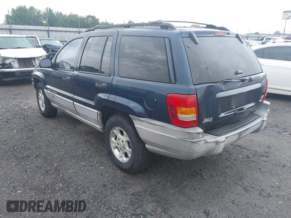 2000 Jeep Grand Cherokee Laredo with VIN 1J4G248S4YC144404, listed as a IAAI auction lot 42114635 with 181,854 mi miles and . Bid and sale history available at DreamBid. Image 3.