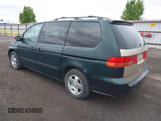2000 Honda Odyssey EX z VIN 2HKRL1865YH010129, wystawiony jako IAAI lot #42258113 z przebiegiem 191 713 mil mil oraz . Historia ofert i sprzedaży dostępna na DreamBid. Obrazek 3.