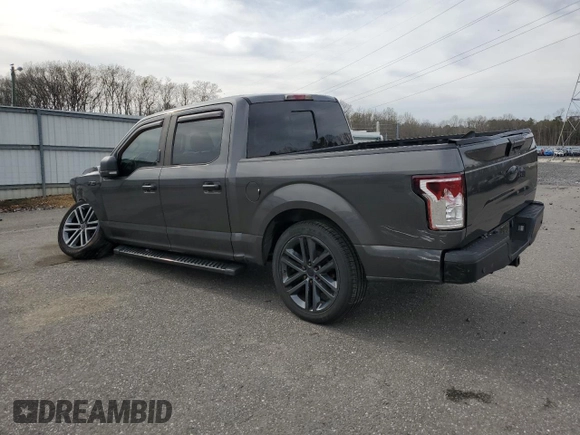 2015 Ford F-150 XLT with VIN 1FTEW1E87FFC44971, listed as a Copart auction lot 51836635 with 206,184 mi miles and Salvage Title. Bid and sale history available at DreamBid. Image 2.