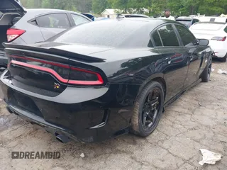 2020 Dodge Charger Scat Pack z VIN 2C3CDXGJ1LH162104, wystawiony jako IAAI lot #42097302 z przebiegiem 44 769 mil mil oraz . Historia ofert i sprzedaży dostępna na DreamBid. Obrazek 4.