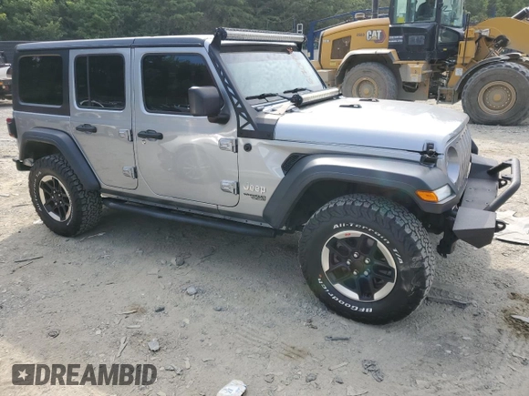2020 Jeep Wrangler Unlimited Sport with VIN 1C4HJXDM5LW208799, listed as a Copart auction lot 61701954 with 33,873 mi miles and Salvage title. Bid and sale history available at DreamBid. Image 4.