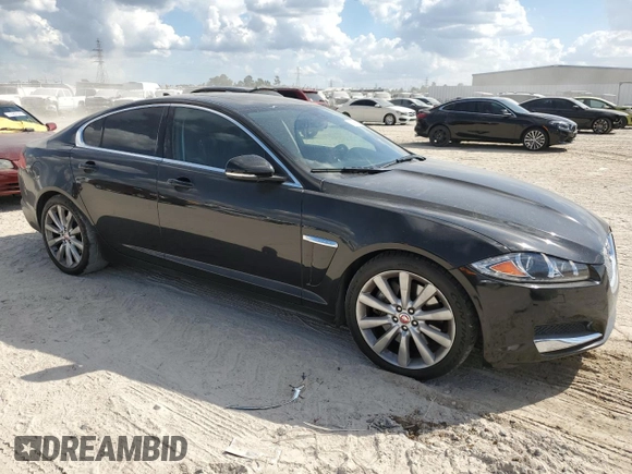 2014 Jaguar XF SC with VIN SAJWA0EX2E8U21886, listed as a Copart auction lot 76783344 with 97,280 mi miles and Salvage Title. Bid and sale history available at DreamBid. Image 4.