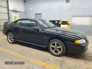 1997 Ford Mustang GT with VIN 1FALP42X4VF192088, listed as a Copart auction lot 84714114 with 194,845 mi miles and Salvage title. Bid and sale history available at DreamBid. Image 4.