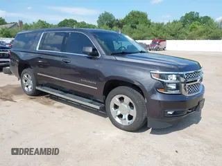 2018 Chevrolet Suburban LT z VIN 1GNSKHKC3JR283748, wystawiony jako IAAI lot #42554002 z przebiegiem 131 718 mil mil oraz . Historia ofert i sprzedaży dostępna na DreamBid. Obrazek 1.
