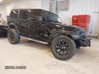 2018 Jeep Wrangler Unlimited Sahara z VIN 1C4HJXEN3JW254054, wystawiony jako IAAI lot #41724635 z przebiegiem 111 697 mil mil oraz . Historia ofert i sprzedaży dostępna na DreamBid. Obrazek 1.