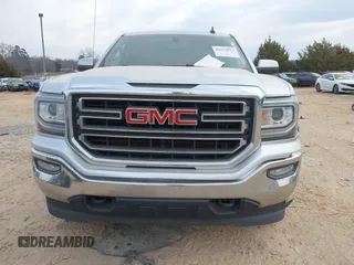 2017 GMC Sierra 1500 SLE z VIN 3GTU2MECXHG128033, wystawiony jako IAAI lot #41672872 z przebiegiem 83 496 mil mil oraz . Historia ofert i sprzedaży dostępna na DreamBid. Obrazek 13.