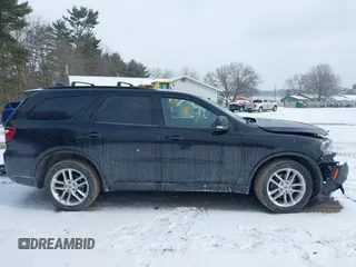 2021 Dodge Durango GT Plus z VIN 1C4RDJDG4MC664136, wystawiony jako IAAI lot #41609333 z przebiegiem 69 400 mil mil oraz . Historia ofert i sprzedaży dostępna na DreamBid. Obrazek 14.