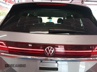2024 Volkswagen Atlas SE with VIN 1V2HR2CA9RC557329, listed as a IAAI auction lot 42734151 with 19,097 mi miles and . Bid and sale history available at DreamBid. Image 10.