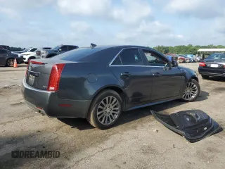 2013 Cadillac CTS Performance z VIN 1G6DK5E3XD0104466, wystawiony jako Copart lot #57479555 z przebiegiem Nie podano mil oraz Szkody całkowita. Historia ofert i sprzedaży dostępna na DreamBid. Obrazek 3.