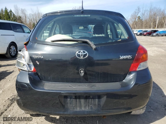 2010 Toyota Yaris with VIN JTDKT4K39A5293349, listed as a Copart auction lot 51993065 with 214,531 mi miles and Clean Title. Bid and sale history available at carsss.com. Image 6.