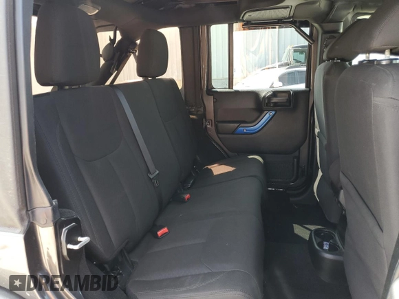 2018 Jeep Wrangler JK Unlimited Sport S with VIN 1C4BJWDG3JL899209, listed as a Copart auction lot 67705634 with 100,679 mi miles and Salvage Title. Bid and sale history available at carsss.com. Image 11.