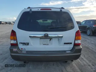 2002 Mazda Tribute LX with VIN 4F2YU09182KM09244, listed as a Copart auction lot 76758954 with Not Provided miles and Non Repairable. Bid and sale history available at carsss.com. Image 6.