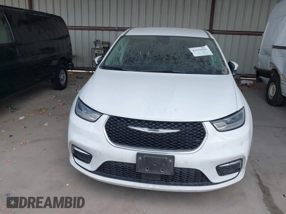 2023 Chrysler Pacifica Touring L with VIN 2C4RC1BG6PR550575, listed as a IAAI auction lot 42576498 with 54,373 mi miles and . Bid and sale history available at DreamBid. Image 12.
