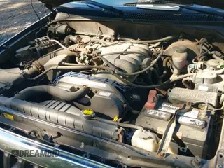 2001 Toyota Tacoma with VIN 5TEHN72N21Z746117, listed as a IAAI auction lot 43338302 with 164,412 mi miles and . Bid and sale history available at DreamBid. Image 19.
