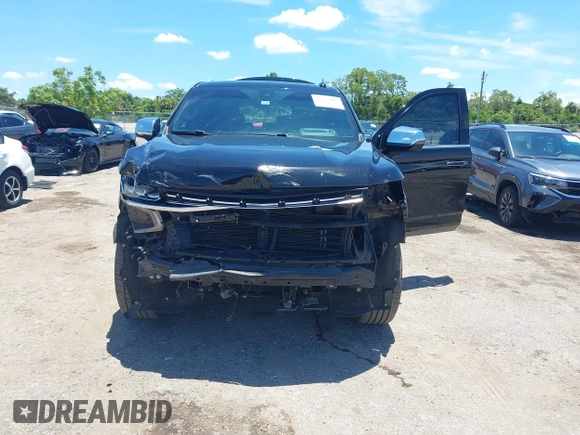 2021 Chevrolet Tahoe Premier with VIN 1GNSKSKDXMR195984, listed as a IAAI auction lot 42528305 with 89,925 mi miles and . Bid and sale history available at DreamBid. Image 6.