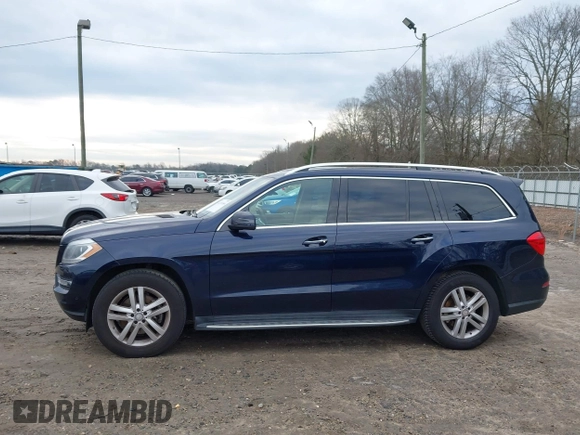 2015 Mercedes-Benz GL-Class GL 450 with VIN 4JGDF6EE9FA513009, listed as a IAAI auction lot 41311164 with 121,185 mi miles. Bid and sale history available at carsss.com. Image 14.