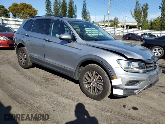 2020 Volkswagen Tiguan SE z VIN 3VV3B7AX8LM036808, wystawiony jako Copart lot #42124825 z przebiegiem 116 297 mil mil oraz Nie do naprawy. Historia ofert i sprzedaży dostępna na DreamBid. Obrazek 4.