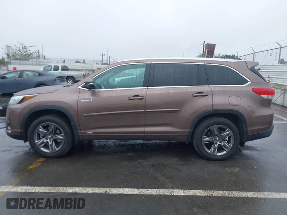 2018 Toyota Highlander Hybrid Limited with VIN 5TDDGRFH2JS039556, listed as a IAAI auction lot 41539754 with 71,924 mi miles and . Bid and sale history available at DreamBid. Image 14.