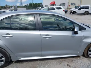 2023 Toyota Corolla LE with VIN JTDB4MEE7P3010297, listed as a IAAI auction lot 42119061 with 51,505 mi miles. Bid and sale history available at carsss.com. Image 13.