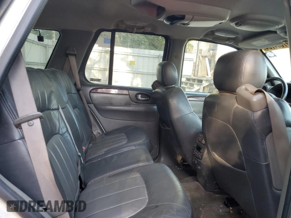 2002 GMC Envoy SLT with VIN 1GKDS13S822460095, listed as a Copart auction lot 77004764 with 267,716 mi miles and Salvage Title. Bid and sale history available at carsss.com. Image 11.