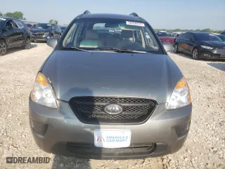 2009 Kia Rondo LX Base with VIN KNAFG528697282779, listed as a Copart auction lot 58926614 with 115,355 mi miles and Salvage Title. Bid and sale history available at carsss.com. Image 5.