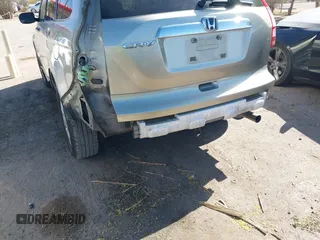 2009 Honda CR-V EX with VIN JHLRE38599C007909, listed as a IAAI auction lot 42077656 with 223,597 mi miles and . Bid and sale history available at carsss.com. Image 6.