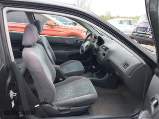 1997 Honda Civic EX with VIN 1HGEJ8242VL044722, listed as a IAAI auction lot 42045941 with 266,481 mi miles. Bid and sale history available at carsss.com. Image 5.