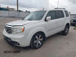 2015 Honda Pilot Touring z VIN 5FNYF4H94FB072907, wystawiony jako IAAI lot #42383169 z przebiegiem 200 040 mil mil oraz . Historia ofert i sprzedaży dostępna na DreamBid. Obrazek 2.