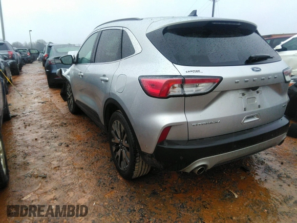 2020 Ford Escape Titanium Hybrid with VIN 1FMCU0DZ8LUB13911, listed as a IAAI auction lot 41249498 with 64,108 mi miles and . Bid and sale history available at DreamBid. Image 3.