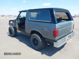 1988 Ford Bronco XL with VIN 1FMEU15N3JLA69197, listed as a IAAI auction lot 42082657 with 287,213 mi miles. Bid and sale history available at carsss.com. Image 3.