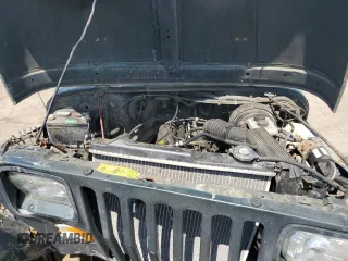 1994 Jeep Wrangler с VIN 1J4FY29S4RP467813, выставлен на аукционе Copart как лот 62484855 с пробегом 213 872 миль миль и Чистый • Clean title. История ставок и продаж доступна на DreamBid. Изображение 11.