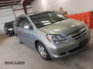 2007 Honda Odyssey EX-L with VIN 5FNRL38737B095747, listed as a IAAI auction lot 42126000 with 178,779 mi miles. Bid and sale history available at carsss.com. Image 1.