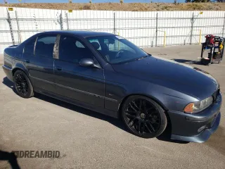 2000 BMW M5 z VIN WBSDE9349YBZ94615, wystawiony jako Copart lot #88802245 z przebiegiem 157 774 mil mil oraz Tytuł czysty. Historia ofert i sprzedaży dostępna na DreamBid. Obrazek 4.