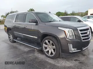 2015 Cadillac Escalade ESV Premium z VIN 1GYS3JKJXFR298776, wystawiony jako IAAI lot #42413979 z przebiegiem 151 503 mil mil oraz . Historia ofert i sprzedaży dostępna na DreamBid. Obrazek 1.