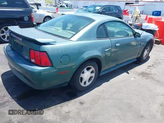 2001 Ford Mustang Standard z VIN 1FAFP404X1F217978, wystawiony jako IAAI lot #42569548 z przebiegiem 199 730 mil mil oraz . Historia ofert i sprzedaży dostępna na DreamBid. Obrazek 4.