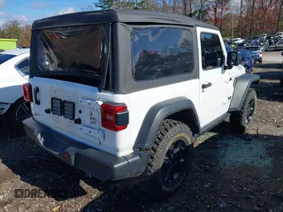 2021 Jeep Wrangler Sport S with VIN 1C4HJXAG0MW757133, listed as a IAAI auction lot 41028980 with 53,165 mi miles and . Bid and sale history available at DreamBid. Image 4.