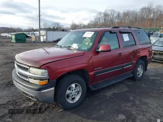2001 Chevrolet Tahoe LT with VIN 1GNEK13TX1J281979, listed as a IAAI auction lot 41623086 with 297,509 mi miles. Bid and sale history available at carsss.com. Image 2.